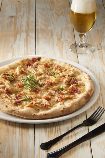 Pizza with Porcinfinito, Gransalsa leek sauce and Cooked smoked jowl bacon