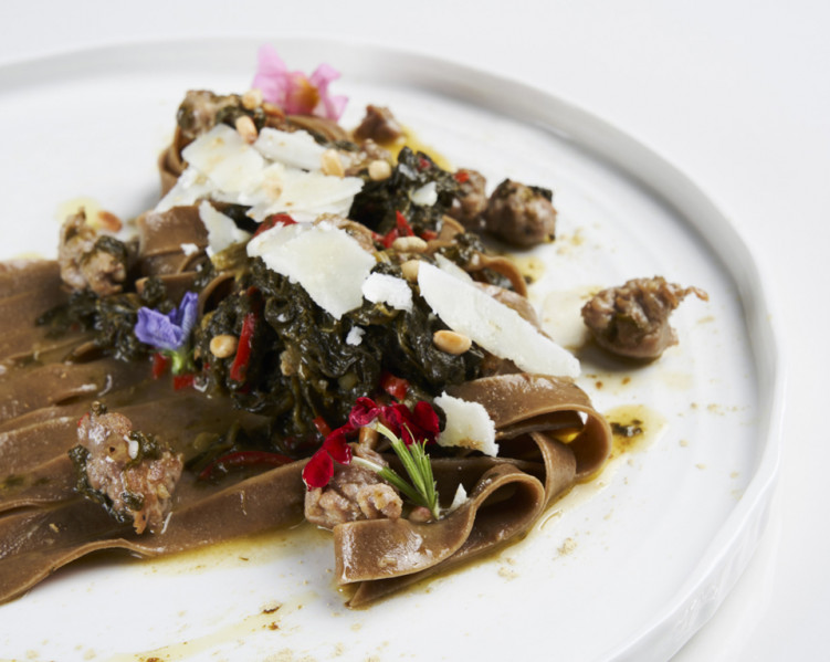 LIQUORICE TAGLIATELLE WITH TURNIP TOPS,  SAUSAGE AND TOASTED PINE NUTS