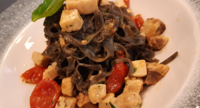 Squid ink Taglioli with Swordfish and Cherry Tomatoes