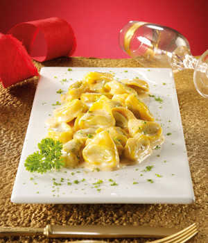 Tortelli stuffed with artichokes on smoked scamorza velloute