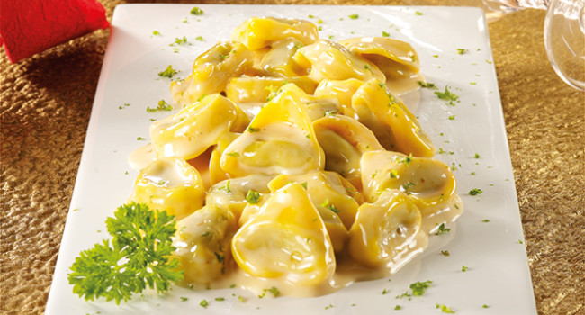 Tortelli stuffed with artichokes on smoked scamorza velloute
