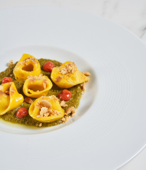 Creamed salted cod tortelli with turnip top spread and Sciacca anchovy fondue